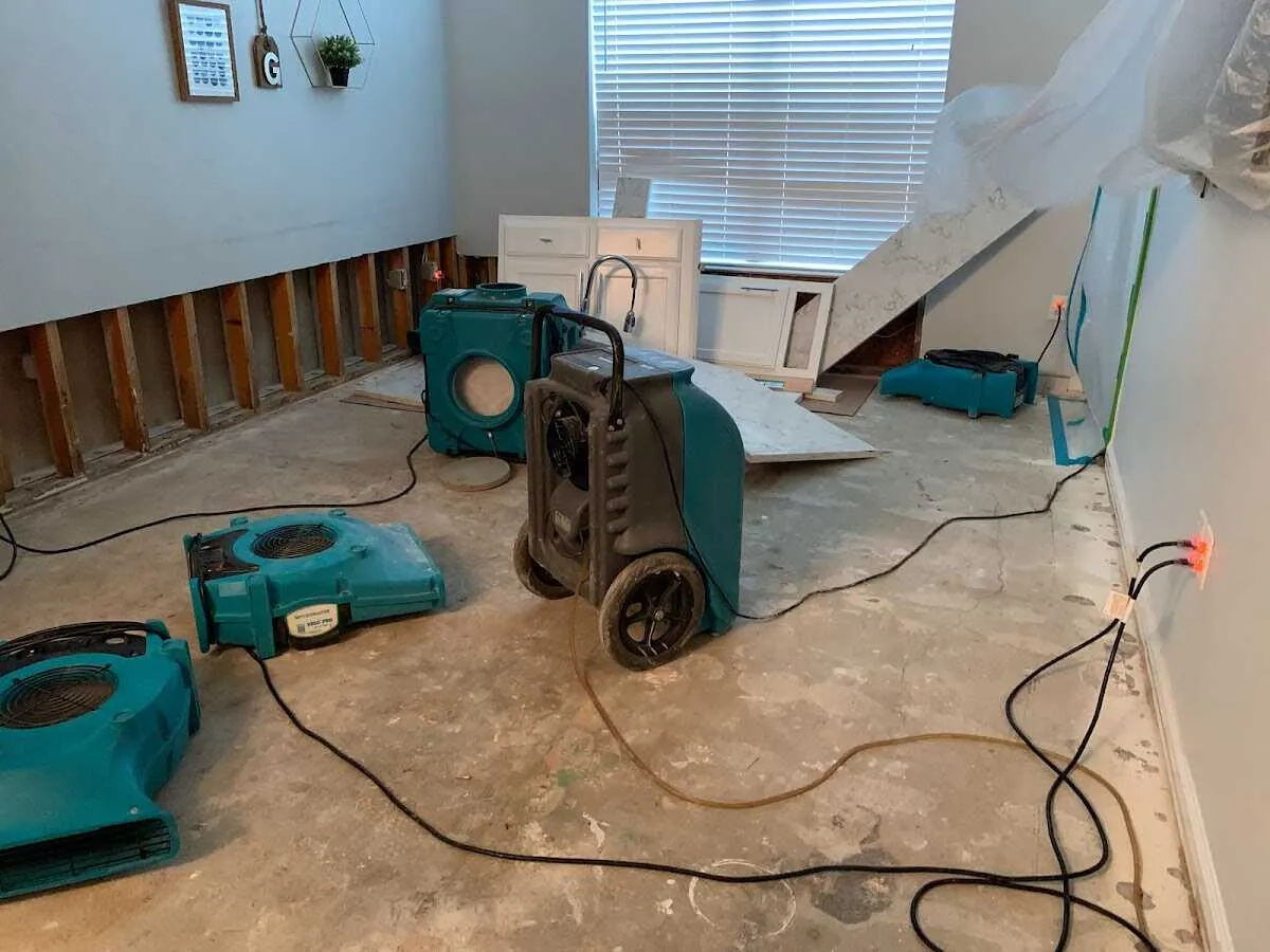 Dehumidifier in flood-cut room for Water Damage Restoration in Stanford